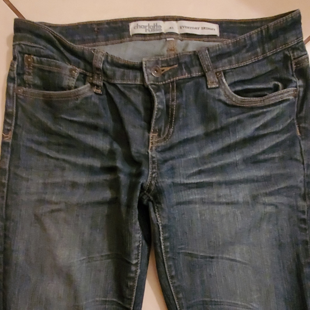 **7 for $25 Medium colored jeans..